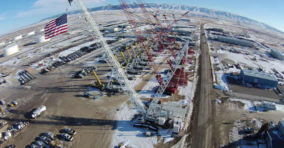 Cranes and trucks at the Energy Transportation site
