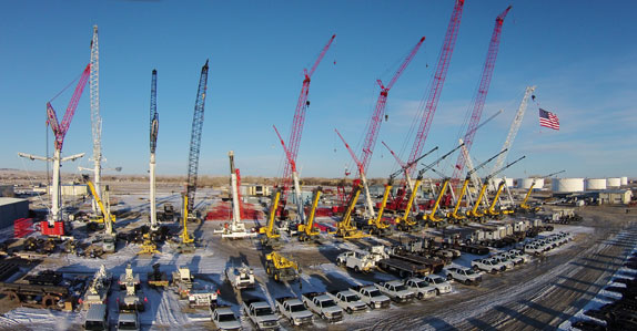 Cranes and trucks at the Energy Transportation site