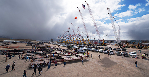 A view of the cranes, trucks and equipment in the yard