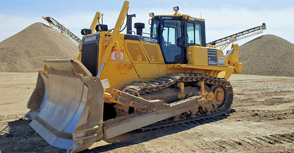 Komatsu 155AX dozer sold at a Ritchie Bros. unreserved public equipment and truck auction.