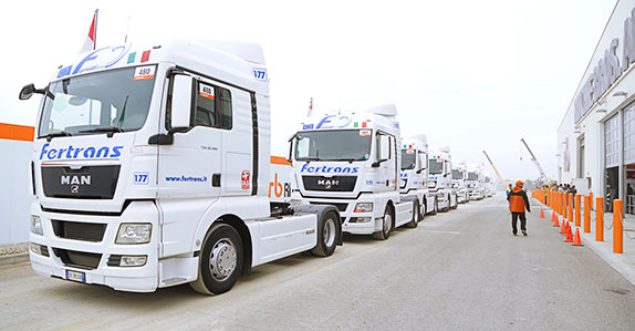 Transport trucks selling at a Ritchie Bros. auction in Caorso, Italy in 2015