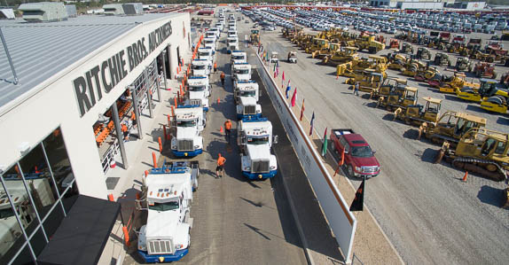 Truck tractors selling on the ramp at the Ritchie Bros. Ft Worth, TX auction facility – September 2015