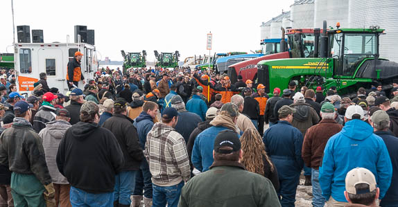 Crowds at Ritchie Bros. farm auction in Nut Mountain, Saskatchewan.
